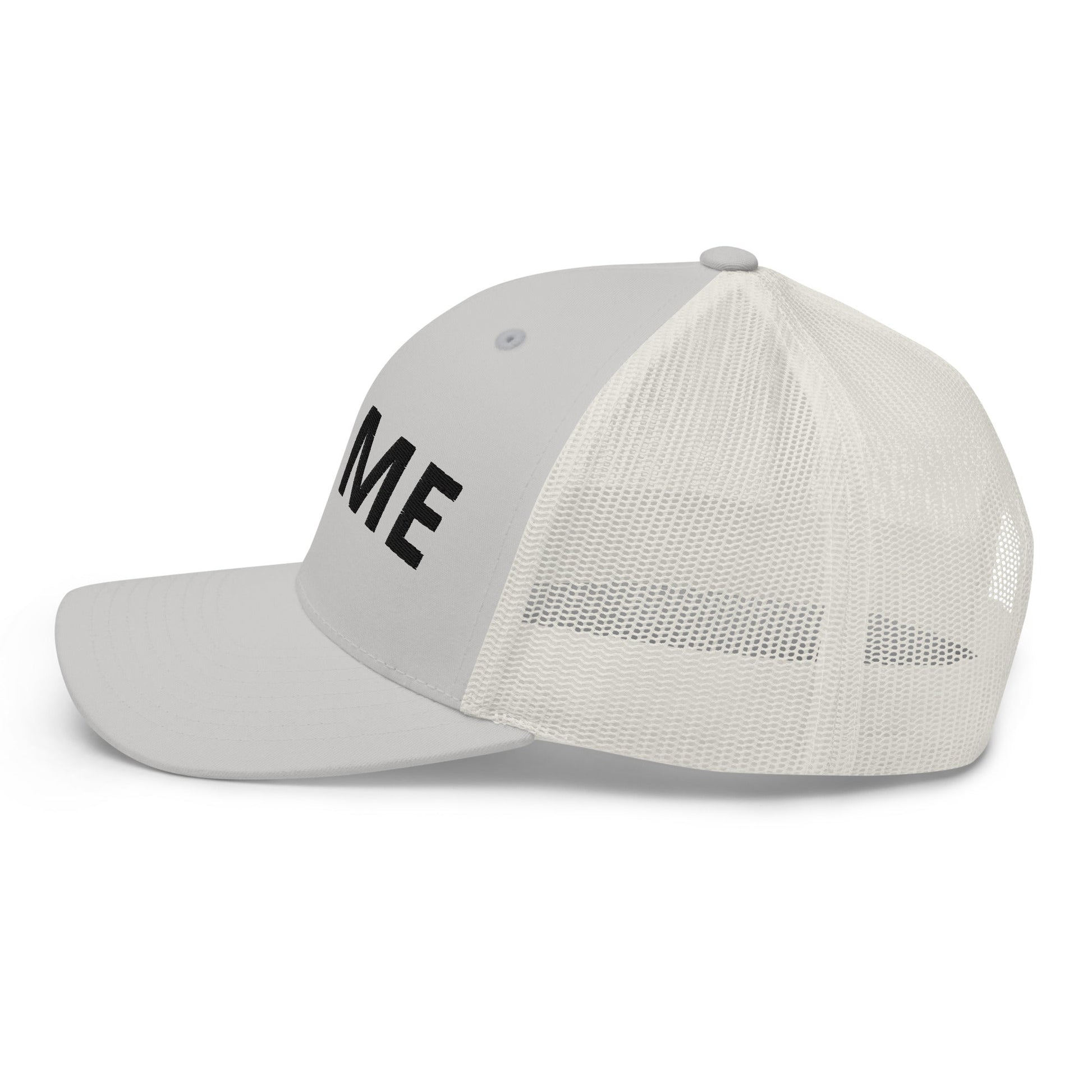 Grey L@ME trucker cap with structured front and breathable mesh back panels.